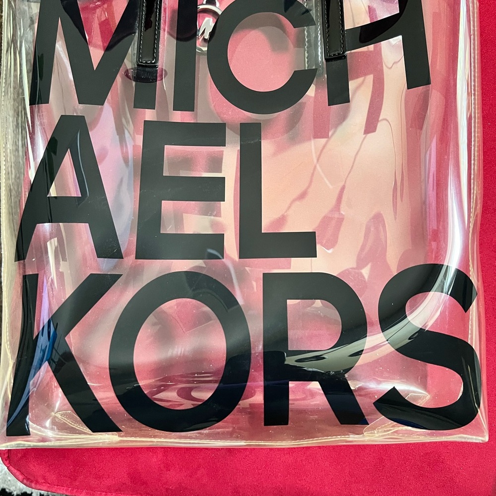 Michael Kors clear bag.